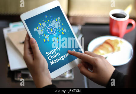 SCM Supply Chain Management concept Modern people doing business, graphs and charts being demonstrated Stock Photo