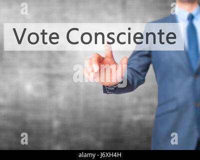 Vote Consciente - Businessman hand pressing button on touch screen interface. Business, technology, internet concept. Stock Photo Stock Photo
