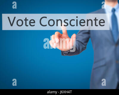 Vote Consciente - Businessman hand pressing button on touch screen interface. Business, technology, internet concept. Stock Photo Stock Photo