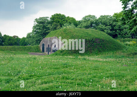 NAARDEN - NETHERLANDS - MAY 13, 2017: Naarden is an example of a star fort, complete with fortified walls and a moat. The moat and walls have been res Stock Photo