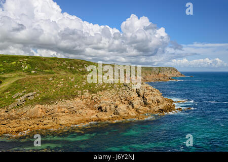 Rugged cliffs at Porthgwarra Cove near Land's End in Cornwall Stock Photo