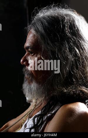 QUEZON CITY, PHILIPPINES - FEBRUARY 3, 2017: Portrait of an Asian man with long gray hair, beard and moustache Stock Photo