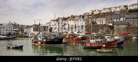 UK, Cornwall, Mevagissey, fishing boats moored in the harbour, panoramic Stock Photo