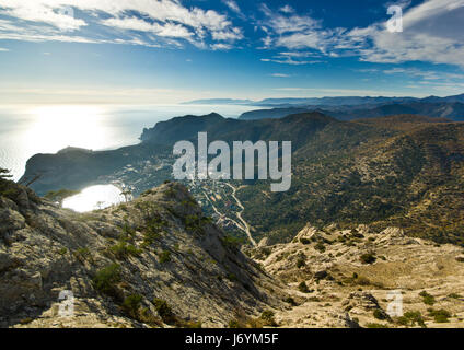 sunset above the Black Sea and mountains Stock Photo