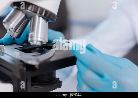 Close up of microscope being ready for inventing Stock Photo