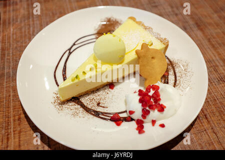 A slice of lemon tart. Stock Photo