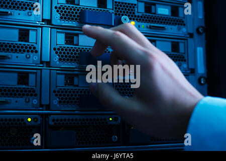Male hand pressing the button Stock Photo