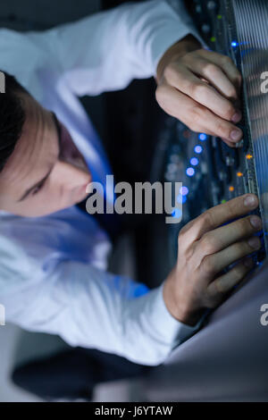 Top view of a man working in the data center Stock Photo