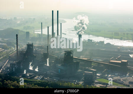 Steelworks ThyssenSteel, steel industry, heavy industry, mining industry, air pollution, emissions, chimneys, Rhine arc, river, haze, dust, blast fu Stock Photo