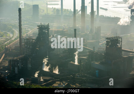 Steelworks ThyssenSteel, steel industry, heavy industry, mining industry, air pollution, emissions, chimneys, Rhine arc, river, haze, dust, blast fu Stock Photo