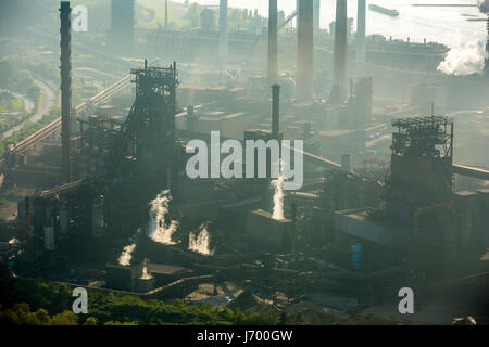 Steelworks ThyssenSteel, steel industry, heavy industry, mining industry, air pollution, emissions, chimneys, Rhine arc, river, haze, dust, blast fu Stock Photo