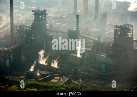 Steelworks ThyssenSteel, steel industry, heavy industry, mining industry, air pollution, emissions, chimneys, Rhine arc, river, haze, dust, blast fu Stock Photo