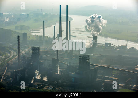 Steelworks ThyssenSteel, steel industry, heavy industry, mining industry, air pollution, emissions, chimneys, Rhine arc, river, haze, dust, blast fu Stock Photo