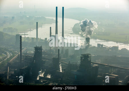 Steelworks ThyssenSteel, steel industry, heavy industry, mining industry, air pollution, emissions, chimneys, Rhine arc, river, haze, dust, blast fu Stock Photo