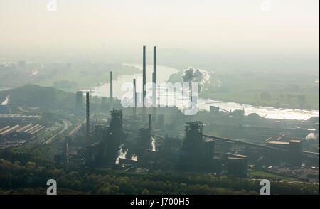 Steelworks ThyssenSteel, steel industry, heavy industry, mining industry, air pollution, emissions, chimneys, Rhine arc, river, haze, dust, blast fu Stock Photo