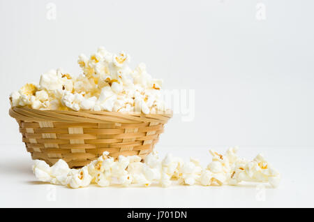 popcorn in basket  on white background Stock Photo