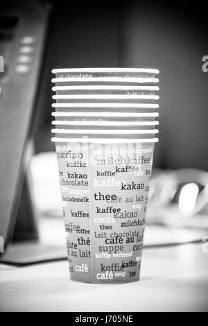 stack of cups on desk Stock Photo