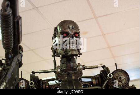 Robot (metal) assassin with automatic weapon Stock Photo