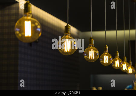 Modern Design Light Bulbs in Row inside Shop Stock Photo