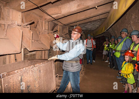 Queen Mine Tour in Bisbee, Arizona, USA. Tour on mine train deep into what was once one of the most productive copper mines of the 20th Century. Here, Stock Photo