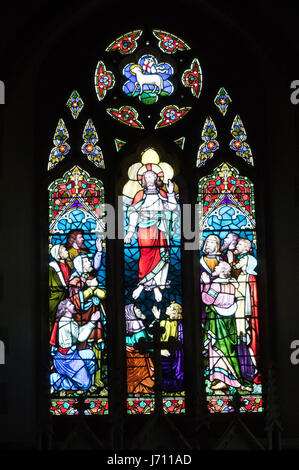 Stained glass window of St Peter's Church in Stoke Fleming, Devon Stock Photo