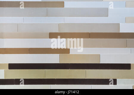 Abstract background from metal stripes of different color and size Stock Photo