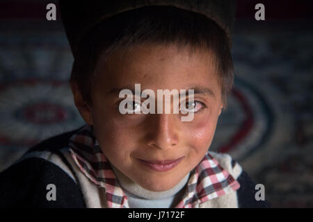 Bakhtiari kid wearing traditional costume in Chelgerd, Iran Stock Photo