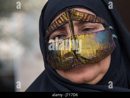 Bandari woman wearing traditional mask , Qeshm Island, iran Stock Photo