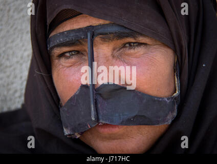 Bandari woman wearing traditional mask , Qeshm Island, iran Stock Photo