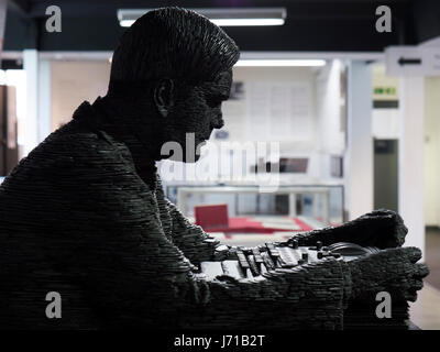 Stacked slate sculpture of codebreaker Alan Turing by artist Stephen Kettle. The memorial stands at Bletchley Park - home of the WWll codebreakers. Stock Photo