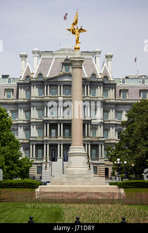 the first division monument in front of the old executive office building Washington DC USA Stock Photo