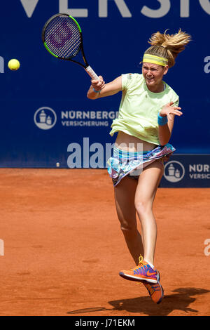 Marie Bouzkova of the Czech Republic in action against Germany's Tatjana Maria (not pictured) during their first round match at the WTA tennis tournament in Nuremberg, Germany, 22 May 2017. Photo: Daniel Karmann/dpa Stock Photo