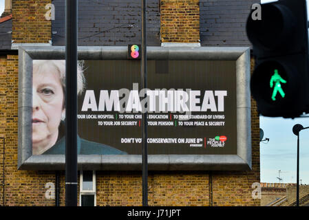 Turnpike Lane, London, UK. 22nd May, 2017. 'I am a Threat' poster from the nationwide billboard campaign crowdfunded by The People's Assembly of PM Theresa May. Credit: Matthew Chattle/Alamy Live News Stock Photo