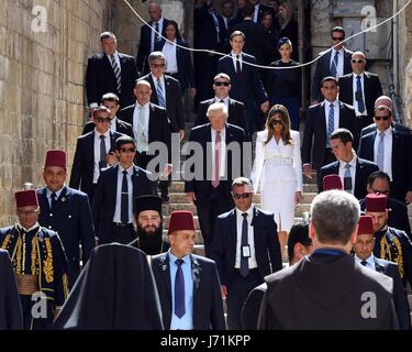 Jerusalem, Israel. 22nd May, 2017. U.S. President Donald Trump and First Lady Melania Trump walk together during a visit to the Church of the Holy Sepulchre May 22, 2017 in Jerusalem, Israel. Credit: Planetpix/Alamy Live News Stock Photo