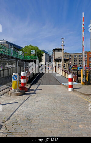 Bristol, UK. 22nd May, 2017. Prince Street Bridge reopens to pedestrians and cyclists after restoration work. The Grade 2 listed swing bridge was built in 1879, but by 2015 its condition had deteriorated to such an extent that the city council was forced to close it to allow major repairs to be carried out. Keith Ramsey/Alamy Live News Stock Photo