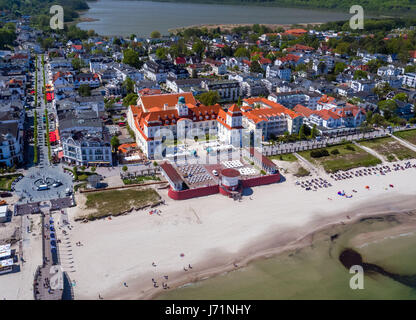 Binz, Germany. 18th May, 2017. The Kurhaus, which is now a 5-star-plus hotel, and seaside promenade with the Kurpark in Binz, Germany, 18 May 2017. (Aerial photograph taken with a drone). Photo: Jens Büttner/dpa-Zentralbild/ZB/dpa/Alamy Live News
