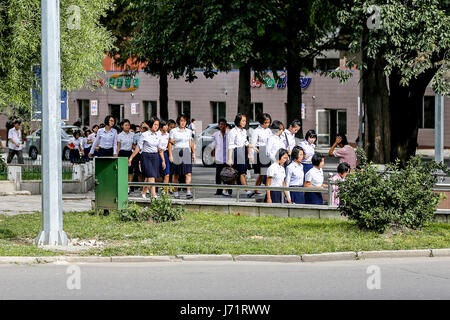 May 23, 2017 - Pyongyan, Pyongyan, China - Pyongyang, North Korea-August 2016: (EDITORIAL USE ONLY. CHINA OUT) Middle school students walking on street in Pyongyang. (Credit Image: © SIPA Asia via ZUMA Wire) Stock Photo