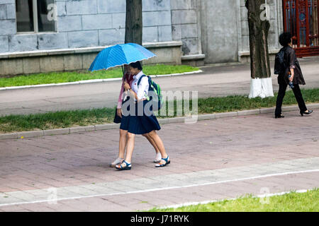 May 23, 2017 - Pyongyan, Pyongyan, China - Pyongyang, North Korea-August 2016: (EDITORIAL USE ONLY. CHINA OUT) Middle school students walking on street in Pyongyang. (Credit Image: © SIPA Asia via ZUMA Wire) Stock Photo