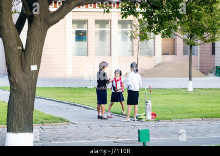 May 23, 2017 - Pyongyan, Pyongyan, China - Pyongyang, North Korea-August 2016: (EDITORIAL USE ONLY. CHINA OUT) Middle school students walking on street in Pyongyang. (Credit Image: © SIPA Asia via ZUMA Wire) Stock Photo