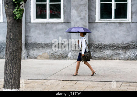 May 23, 2017 - Pyongyan, Pyongyan, China - Pyongyang, North Korea-August 2016: (EDITORIAL USE ONLY. CHINA OUT) Middle school students walking on street in Pyongyang. (Credit Image: © SIPA Asia via ZUMA Wire) Stock Photo