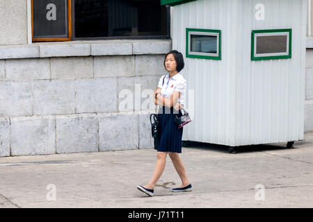 May 23, 2017 - Pyongyan, Pyongyan, China - Pyongyang, North Korea-August 2016: (EDITORIAL USE ONLY. CHINA OUT) Middle school students walking on street in Pyongyang. (Credit Image: © SIPA Asia via ZUMA Wire) Stock Photo