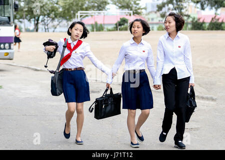 May 23, 2017 - Pyongyan, Pyongyan, China - Pyongyang, North Korea-August 2016: (EDITORIAL USE ONLY. CHINA OUT) Middle school students walking on street in Pyongyang. (Credit Image: © SIPA Asia via ZUMA Wire) Stock Photo