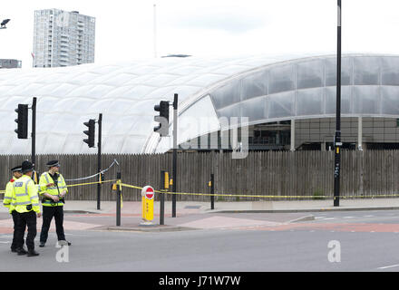 Manchester, UK. 23rd May, 2017. Police stand guard outside Manchester arena in Manchester, Britain on May 23, 2017. The explosion at a pop concert in the British city of Manchester which has left 22 dead and 59 injured was conducted by a lone suicide bomber, police confirmed Tuesday. Credit: Xinhua/Alamy Live News