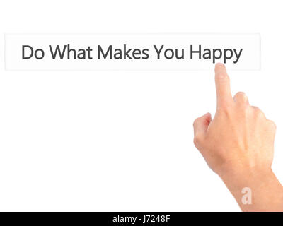 Do What Makes You Happy - Hand pressing a button on blurred background concept . Business, technology, internet concept. Stock Photo Stock Photo