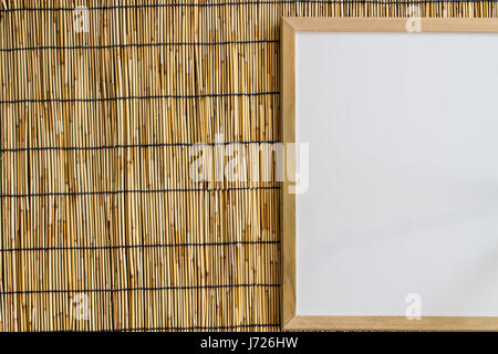 whiteboard with bamboo blind background Stock Photo