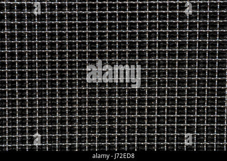 Close up of dark reflective  metal square grid patterns and textures background Stock Photo