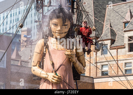 Montreal, CA - 20 May 2017: Royal de Luxe Giants as part of the commemorations of the 375th anniversary of Montreal Stock Photo