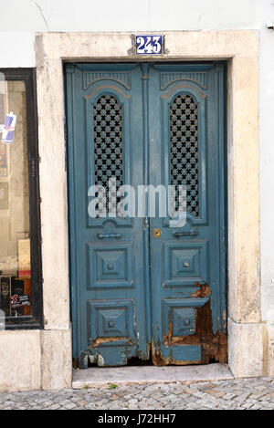 Old wooden painted doors, Lisbon, Portugal Stock Photo