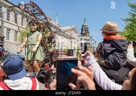 Montreal, CA - 20 May 2017: Royal de Luxe Giants as part of the commemorations of the 375th anniversary of Montreal Stock Photo