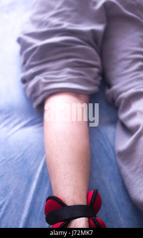 Physical therapy mecical clinic physiotherapy treatment for knee injury and rehabilitation after surgery. Stock Photo